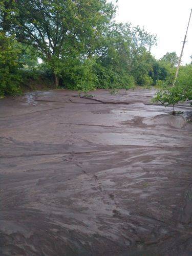 Наступив апокаліпсис: сильний дощ на Черкащині змив дороги та затопив цілі двори (фото)